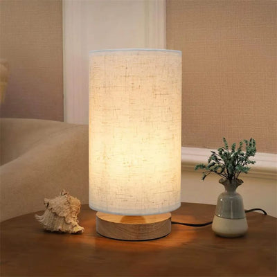 Tolaxa LumiAura. Minimalist Linen Table Lamp with Wooden Base